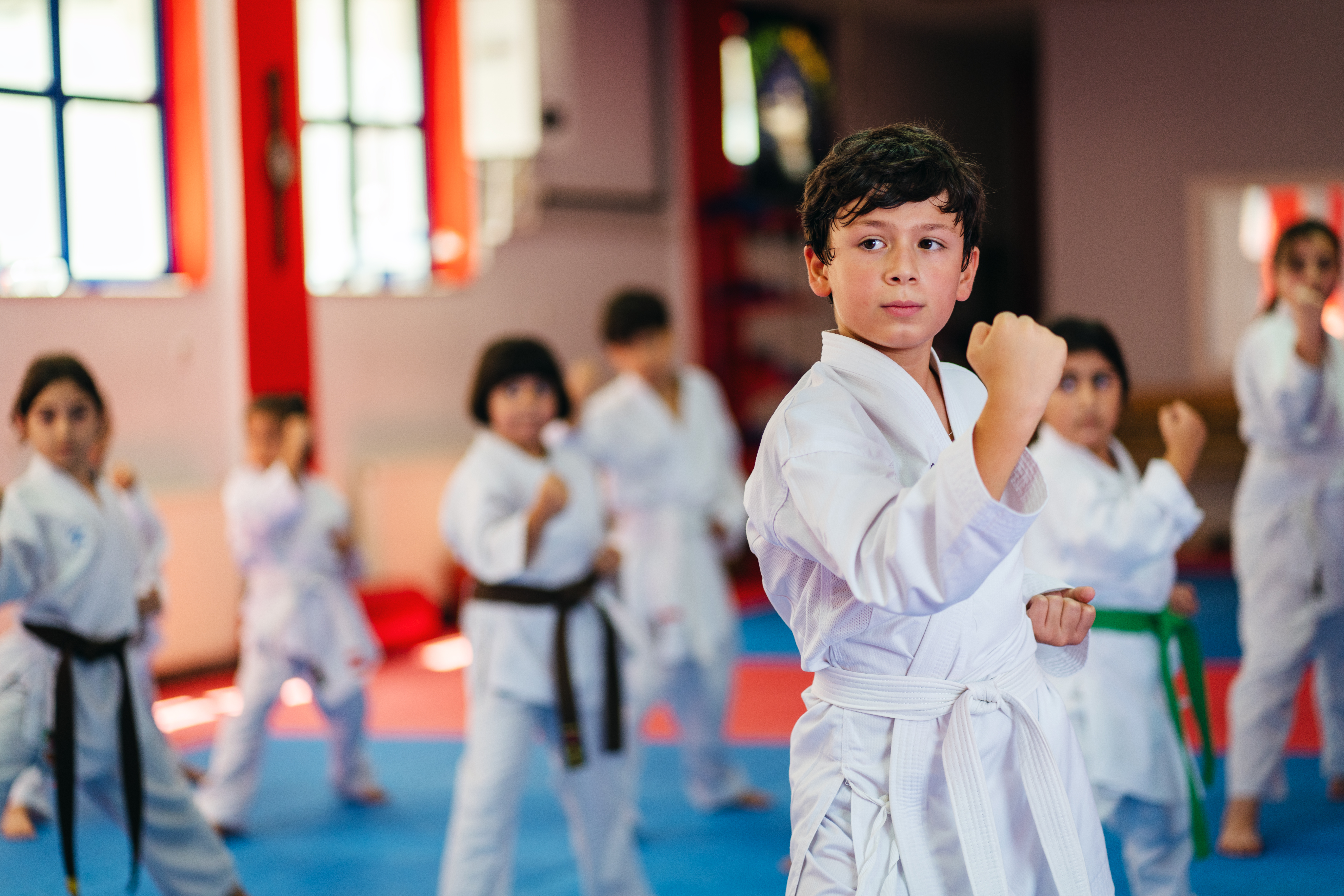 Karate training, Kids of different ages in kimono
