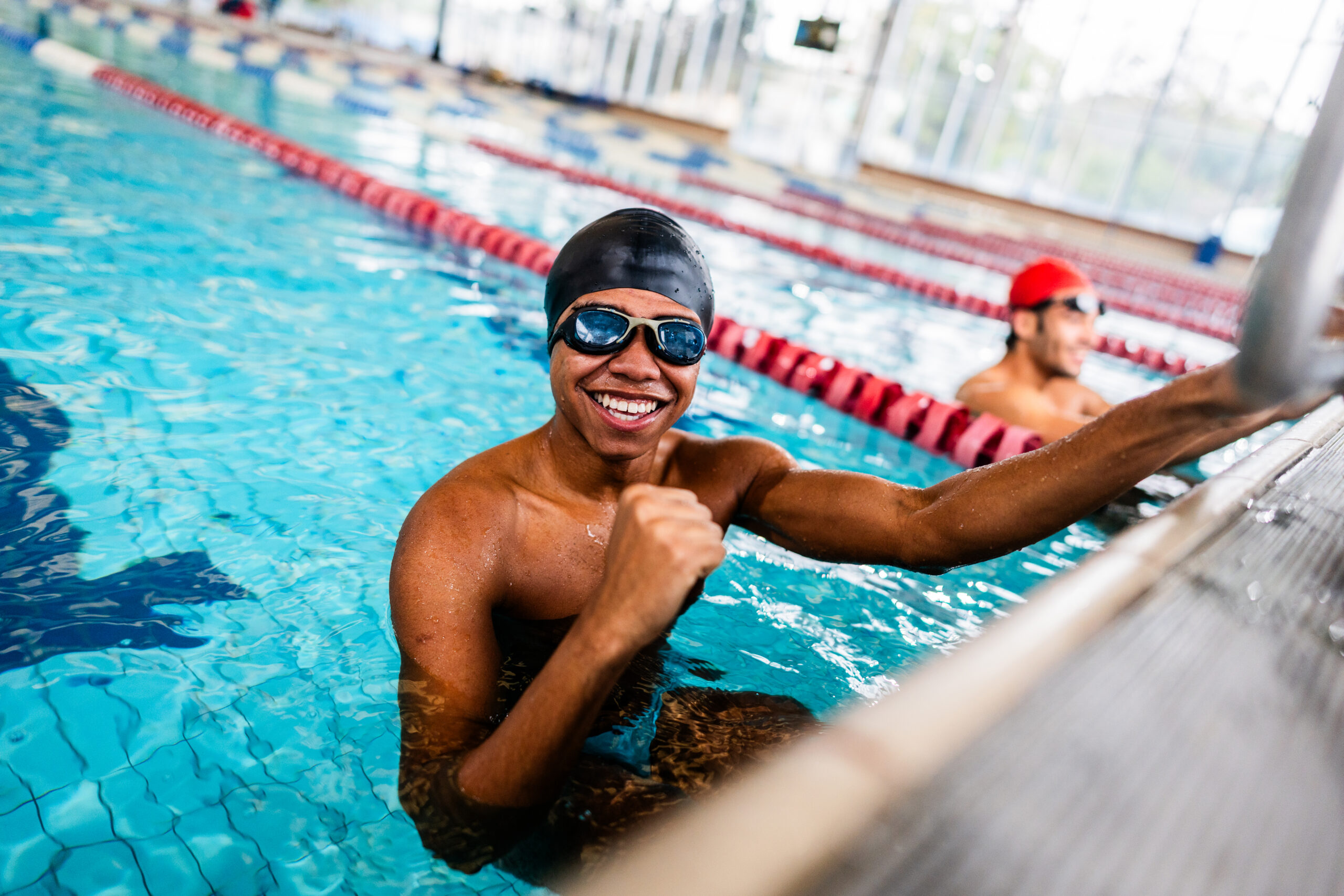 Portrait of a young man in the swimming pool